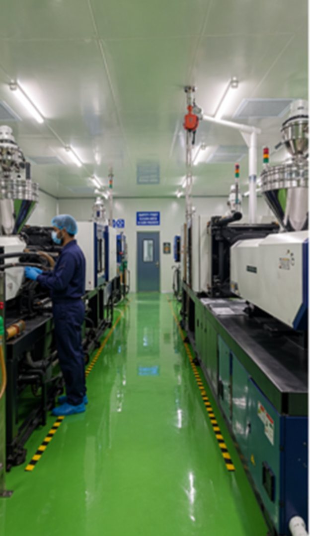 Injection molding machine with operator